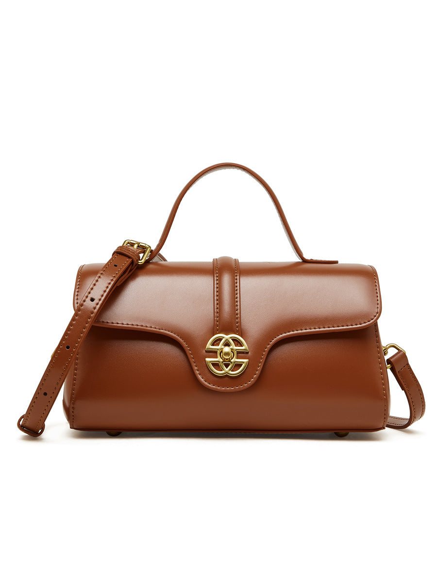 Bolsa de couro com fecho para mulheres.