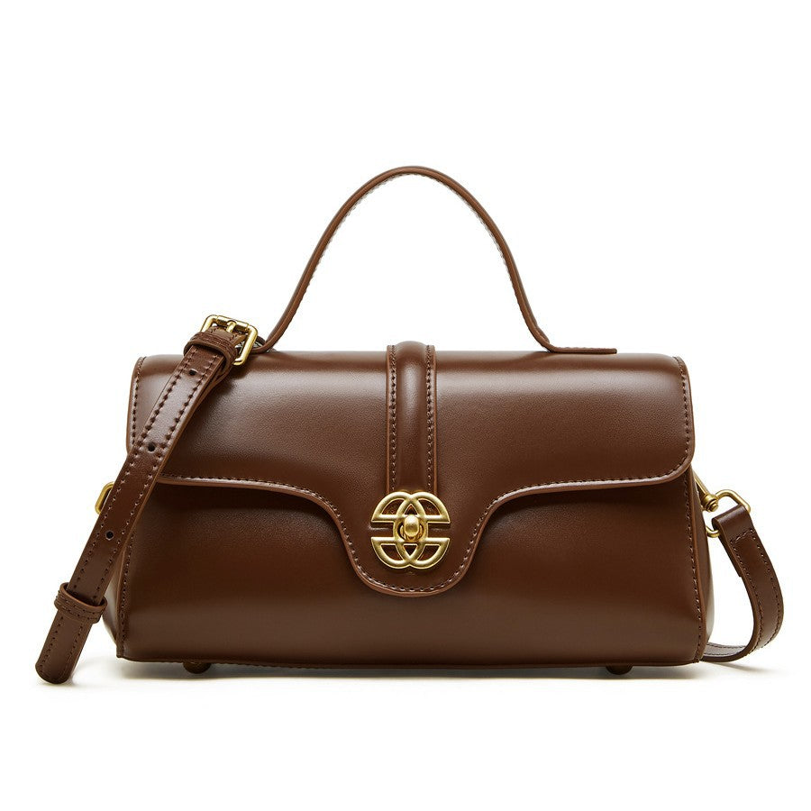 Bolsa de couro com fecho para mulheres.