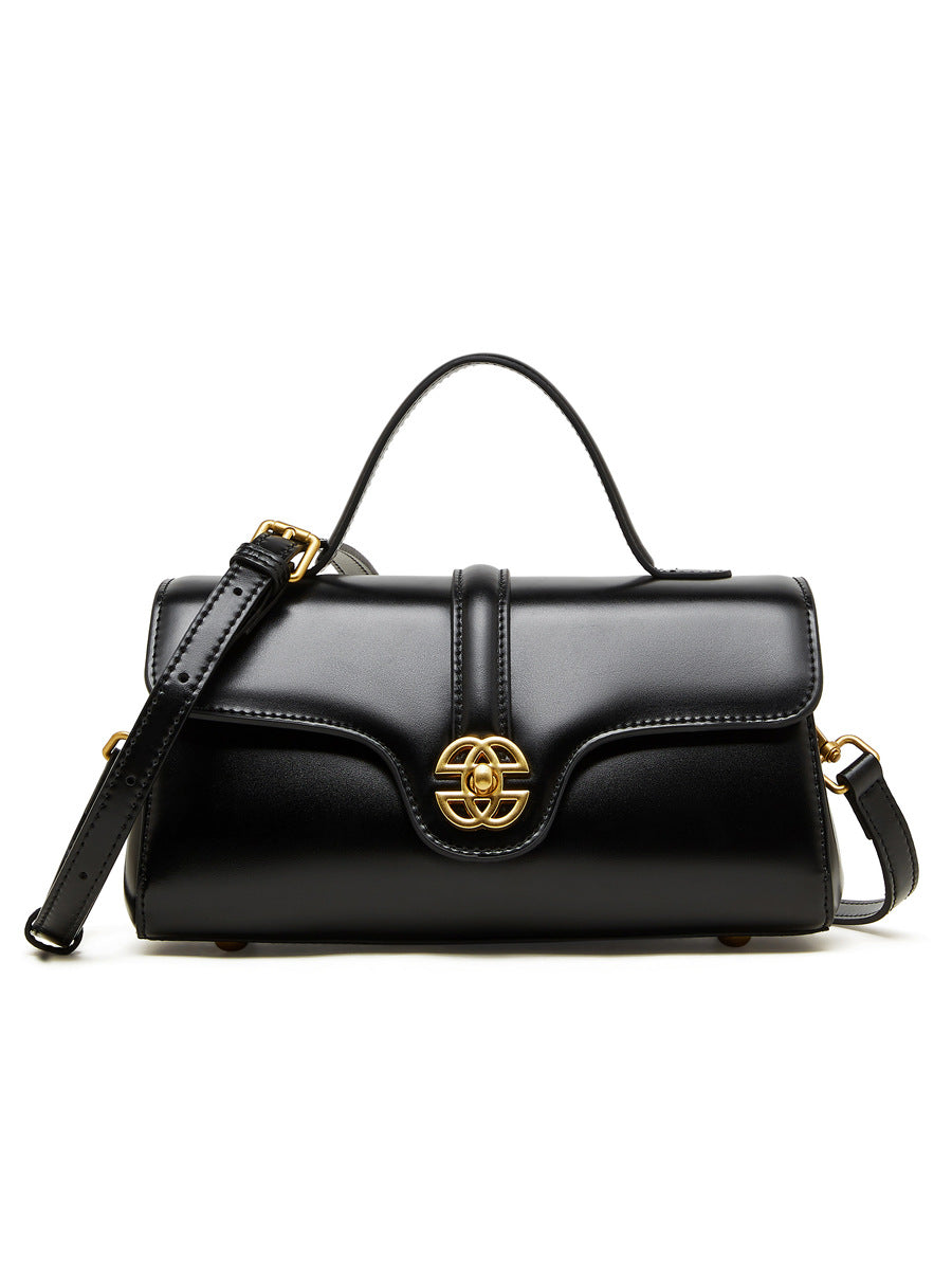 Bolsa de couro com fecho para mulheres.