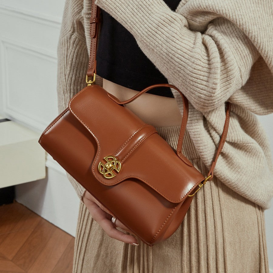  Bolsa de couro com fecho para mulheres.